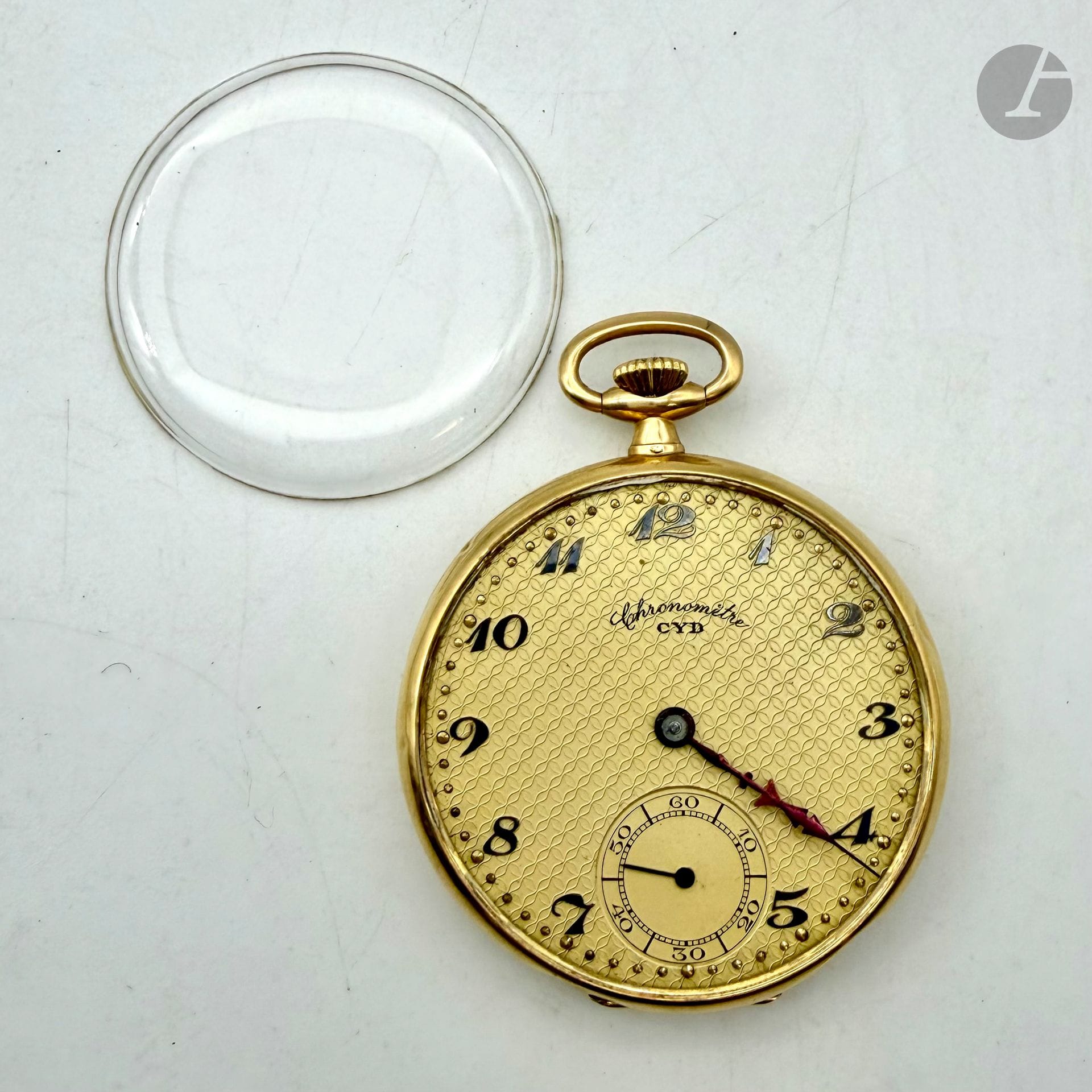 Montre de poche en or jaune 750/°°°.
Mécanisme en métal. 
Poids brut (sans la vitre). : 49, 07 g

FRAIS DE VENTE : 8% HT