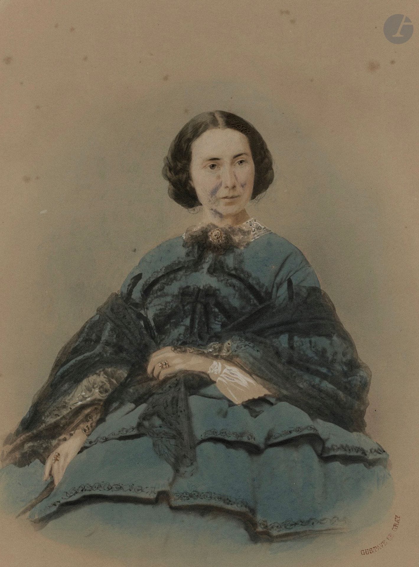 Gustave Le Gray (1820-1884) 
Portrait de femme, 14 avril 1860.  
Épreuve sur papier albuminé rehaussée à l'aquarelle et pastel dans son montage d'époque. Timbre sec "Gustave Le Gray" à l’encre rouge sur l’épreuve en bas à droite. Crédit du photographe et date manuscrite de la main de Gustave Le Gray sur étiquette, contrecollée au verso du montage.  
25 x 18,5 cm (à vue)