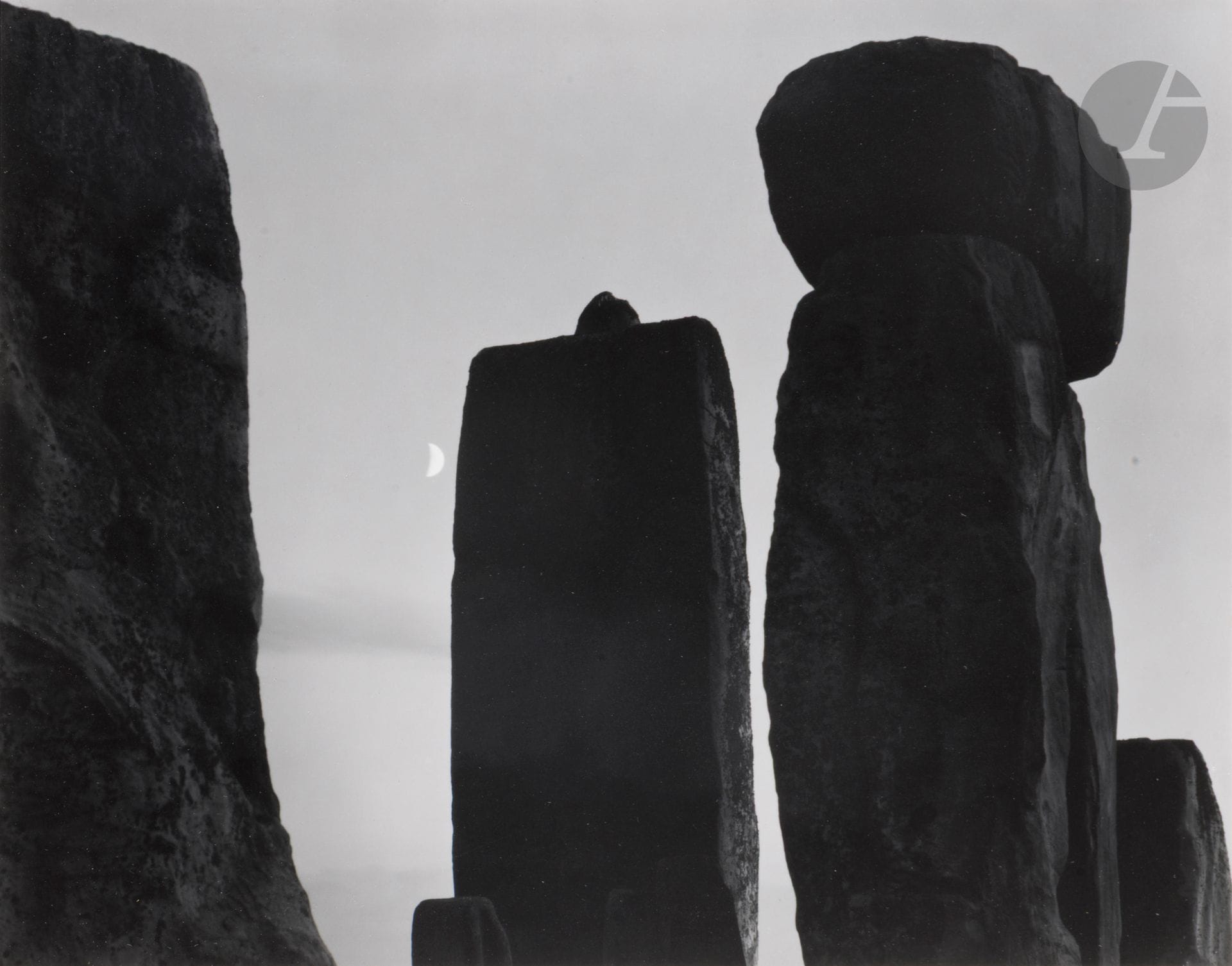 Paul Caponigro (1932-2024) 
Stonehenge. Wiltshire, 1972. 
Silver print (c. 1980), mounted on card, signed and dated in pencil on lower mount. 
16.5 x 21 cm