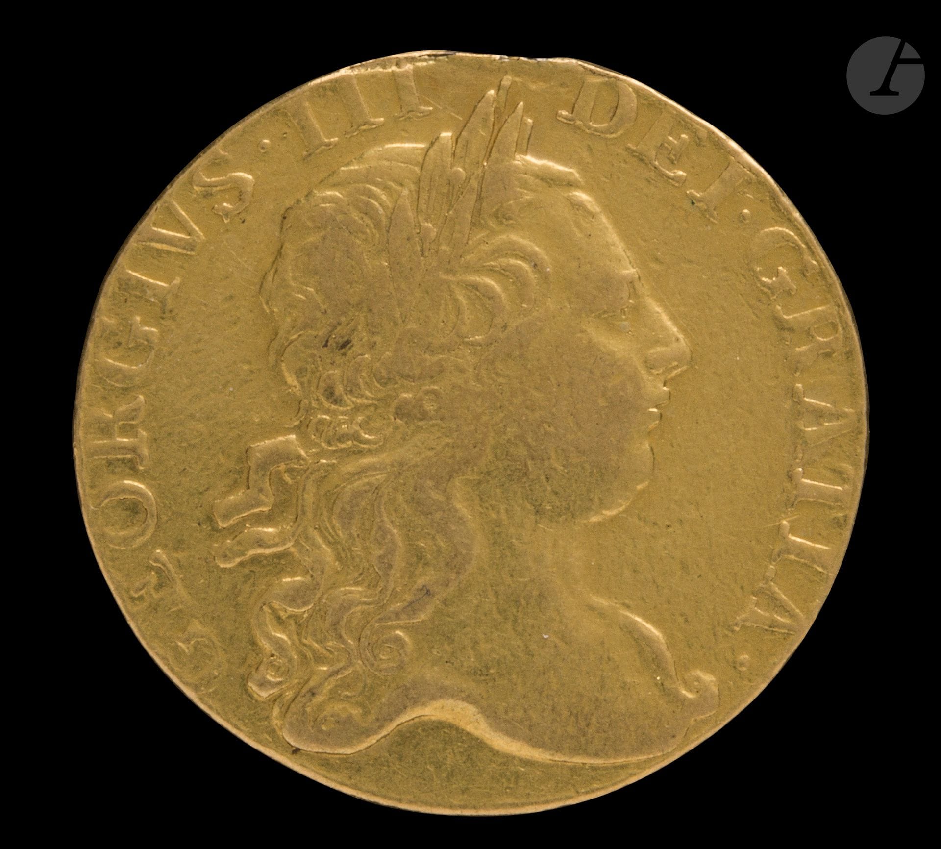 GRANDE-BRETAGNE.
Georges III (1760-1820). 
1 Guinée. Or. 1769. 8,30g. 
Friedberg.354                                   

Trace de monture à 12h.
Presque TB