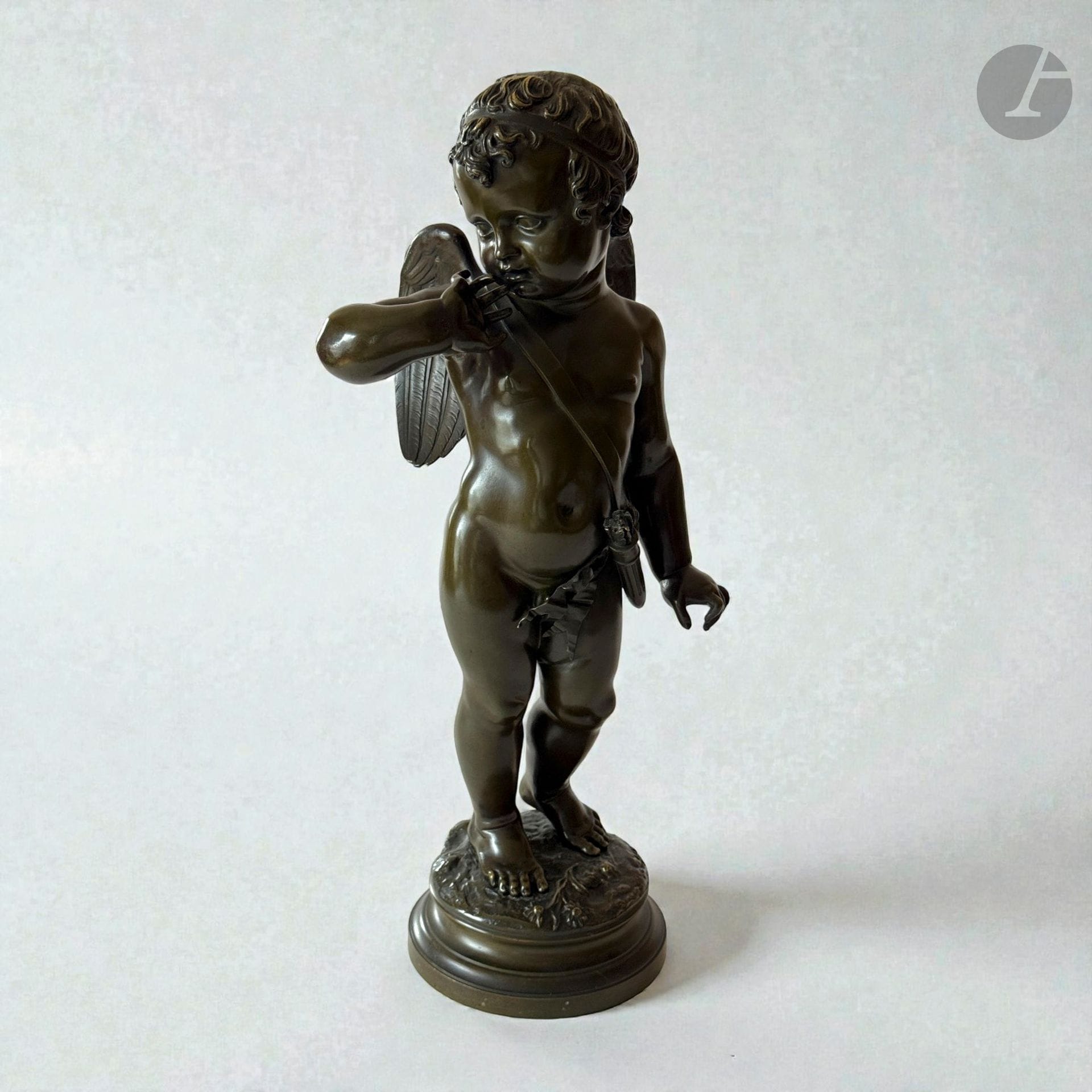 After Jean-Baptiste PIGALLE (1714-1785) 
Cupid
Bronze.
Signed on the terrace.
H. 56.5 cm, W. 25 cm, D. 21 cm