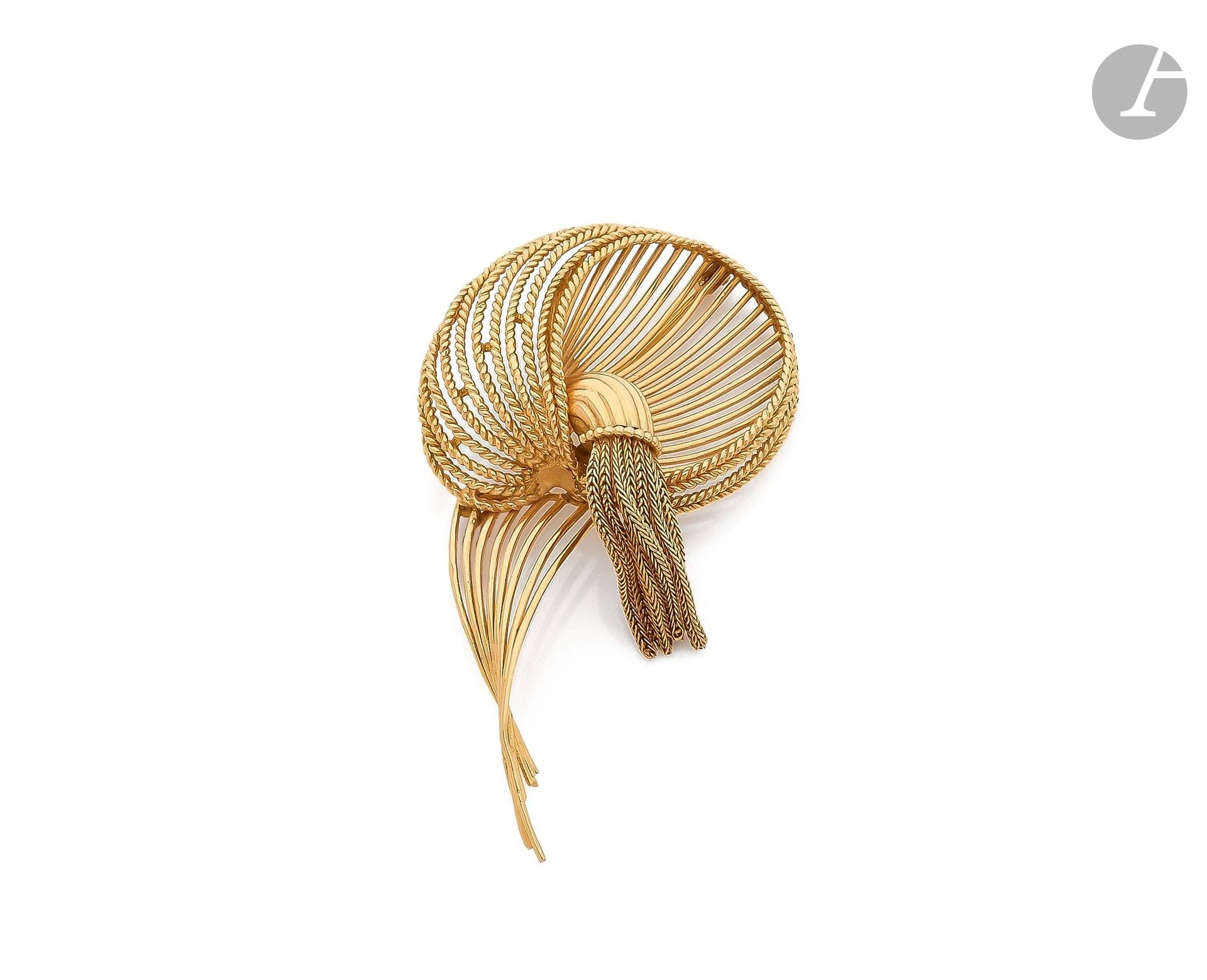 18K (750) gold wire sheaf brooch, smooth and corded. French work from the 1960s. Length: approx. 6cm. Weight: 15.4g (deformations)