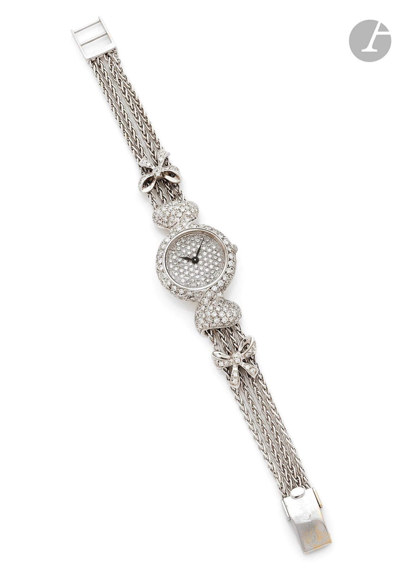 PAOLO BONJA
Montre de dame en or gris 18K (750), pavée de diamants, le bracelet en chaînettes d’or gris 18K, mouvement quartz. Signée et numérotée. Longueur: 17,5cm environ. Poids brut: 42,4g (fonctionnement non garanti)