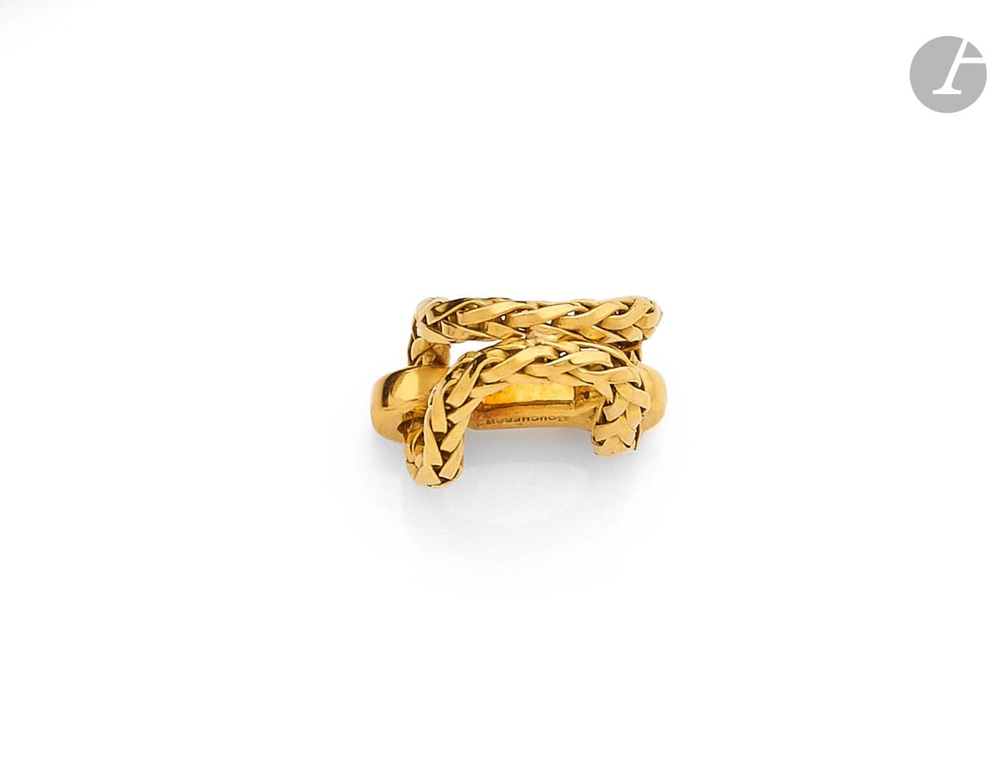 BOUCHERON
Scarf-strap in 18K (750) twisted gold. Signed. French work. Height: 2cm approx. Weight: 6.8g