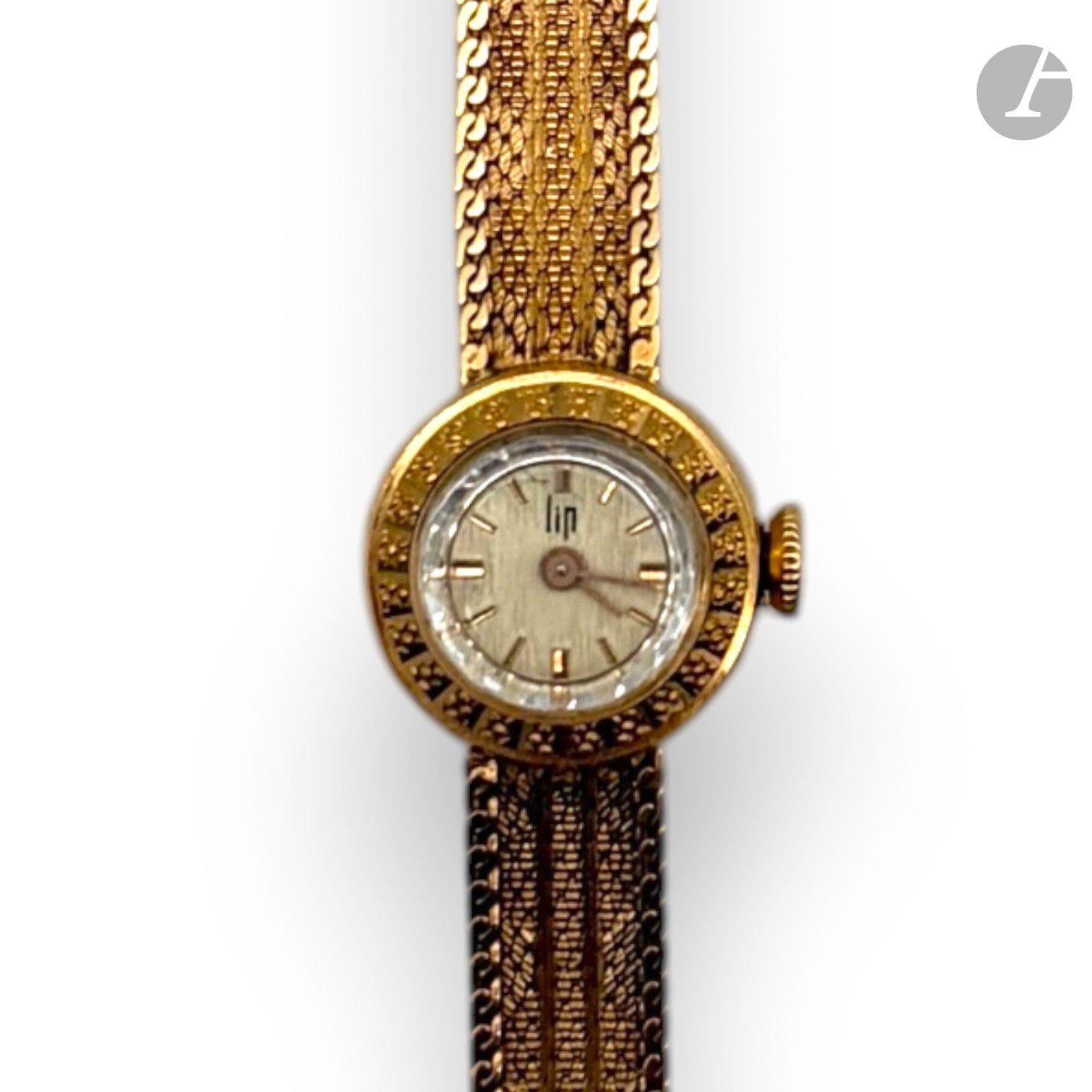 LIP
Montre-bracelet de dame en or 750/°°°. 
La boîte et le bracelet en or. 
Boîtier numéroté 93970.
Poids brut : 23.8g

FRAIS DE VENTE : 8% HT
