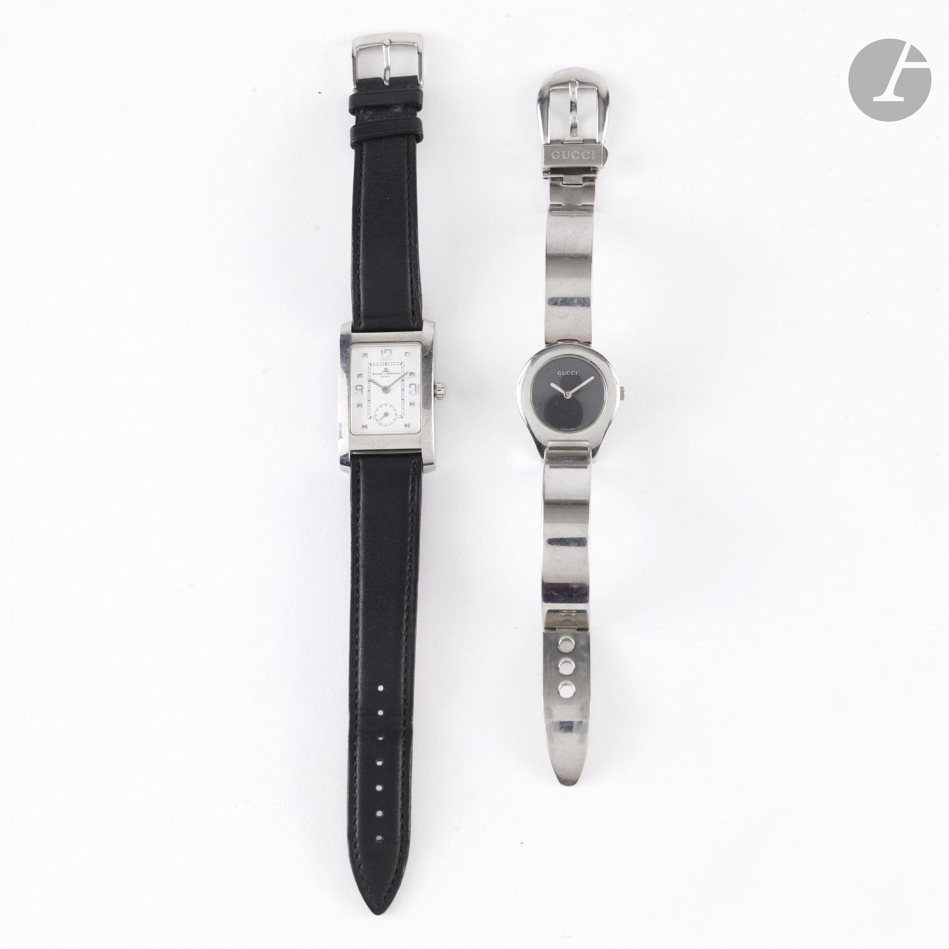 Deux montres à quartz :
- une GUCCI en acier 6700L à bracelet ceinture. L : 18,5 cm
- une BAUME ET MERCIER, boîtier en acier et bracelet non d'origine en cuir noir
(rayures, piles à revoir, fonctionnement non vérifié)