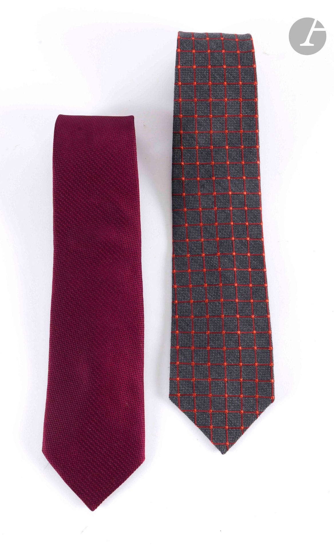 CHRISTIAN DIOR
Two ties in shaped silk, one in burgundy, the other in orange check on a gray background