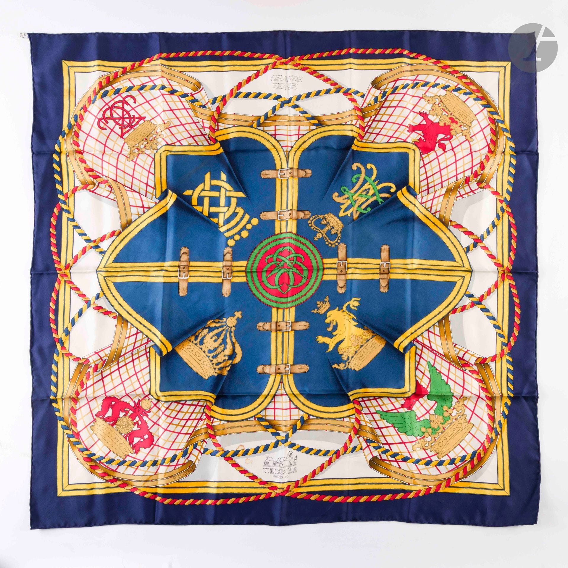 HERMÈS PARIS
Carré 90 in silk twill "Grande Tenue", signed H d'Origny, blue background
(stains)