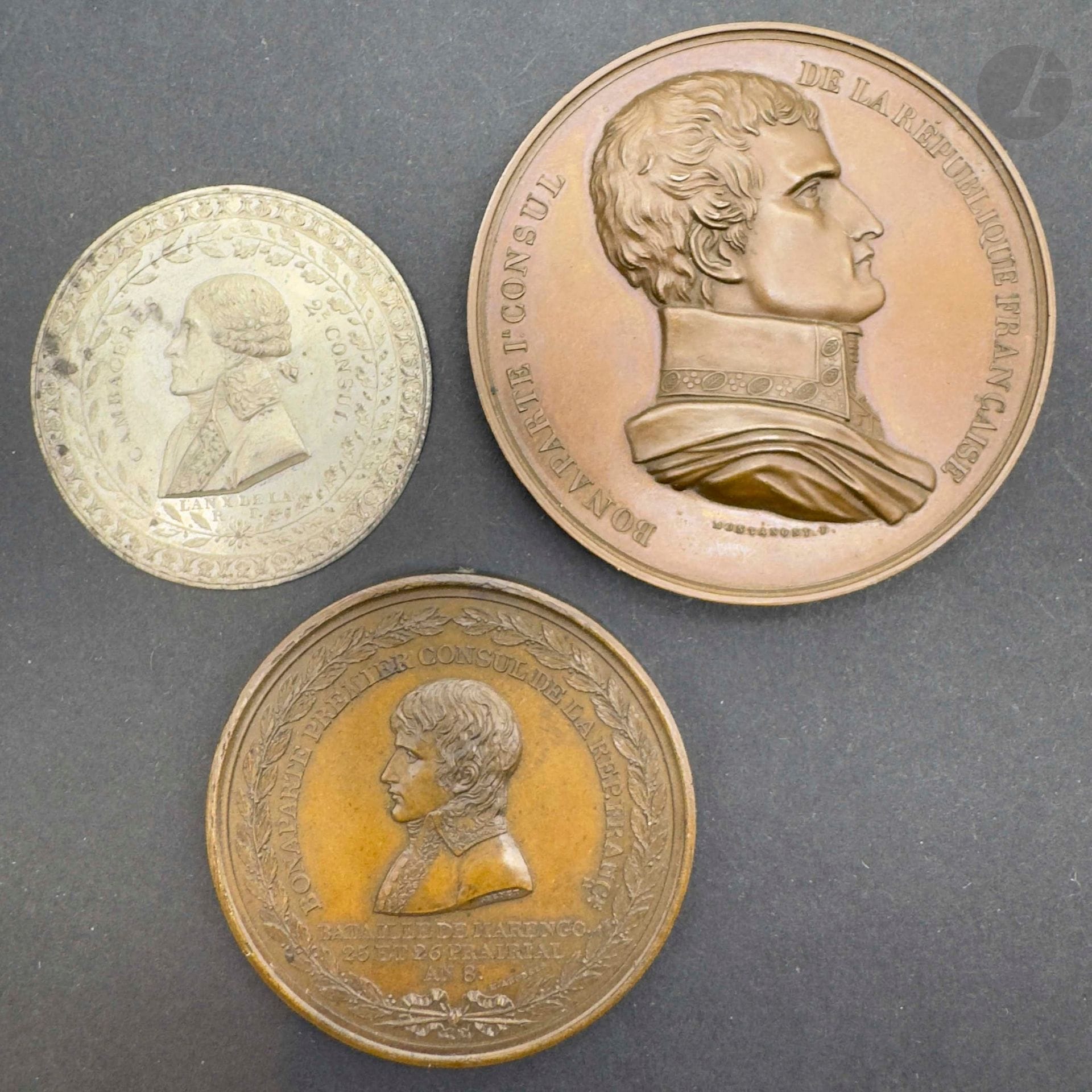 CONSULAT 
Three medals: 
- "Bonaparte 1er consul, Victoire de Marengo et passage du Saint-Bernard 1800", by montagny after andrieu. In patinated bronze. 60 mm. T.T.B. 
Ref: Bramsen 32. 
- cambaceres 2nd consul". One-sided stamped pewter strike. 44 mm. T.T.B. 
Ref: Bramsen 229. 
- "La Bataille de Marengo", by brenet and auguste. Patinated bronze. 48 mm. T.T.B. 
Ref: Bramsen 38.
