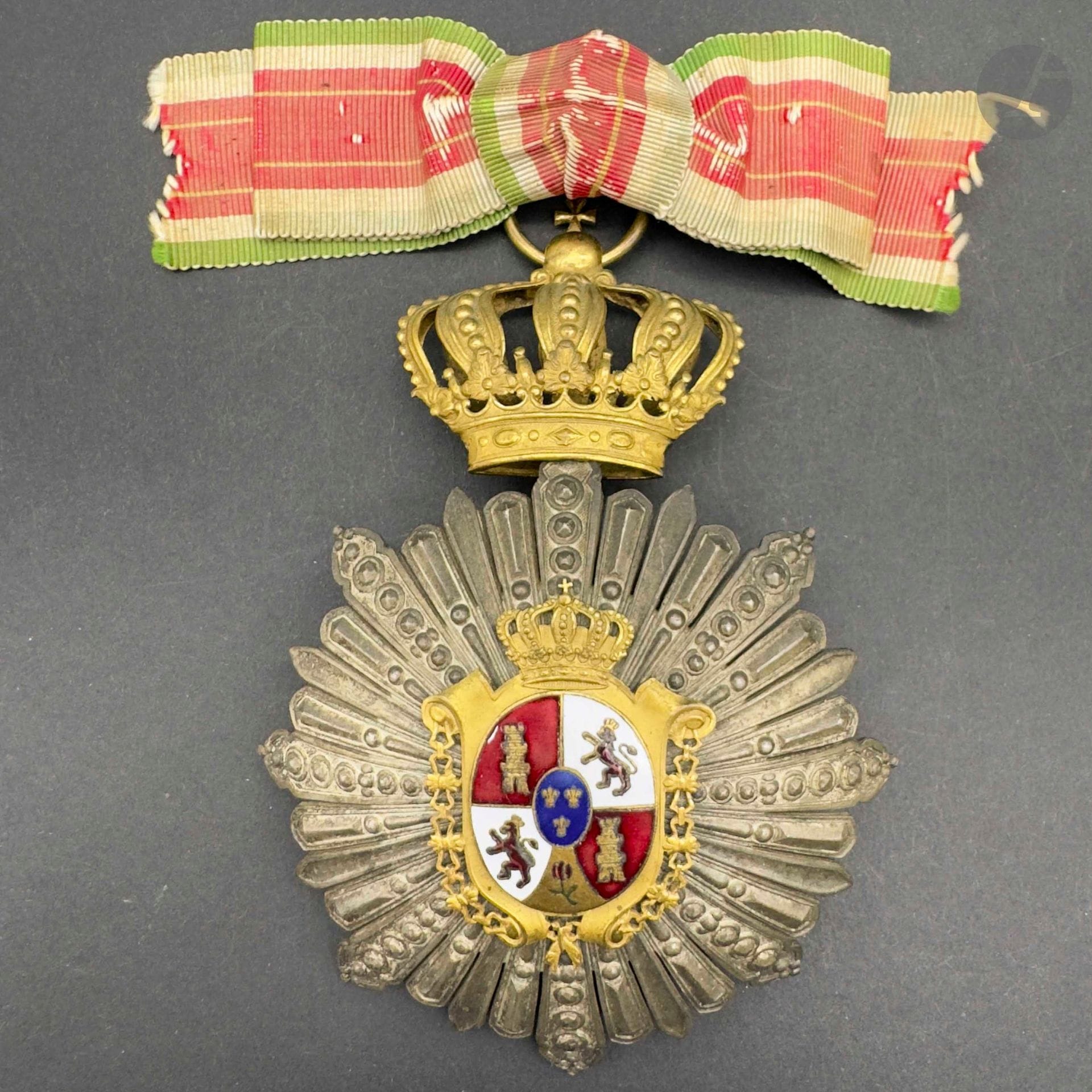 SPAIN 
Badge of office. 
In silver-plated, gilded and enameled metal, under a crown with the great coat of arms of Spain.
Ribbon knot. 
106 x 75 mm 
T.T.B. to SUP.