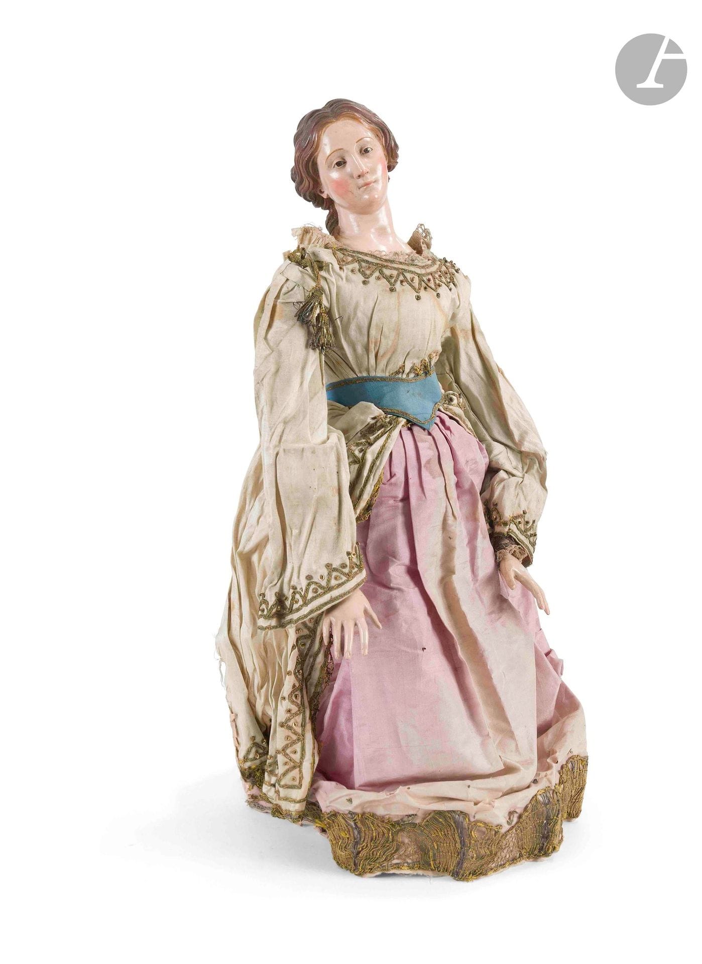 NEAPOLITAN SANTON
Nativity figure of a woman with terracotta head, glass eyes, body dressed in silk garments embellished with metallic embroidery.
Southern Italy, Naples, 19th century
H. 43 cm
Accents and chips, tears