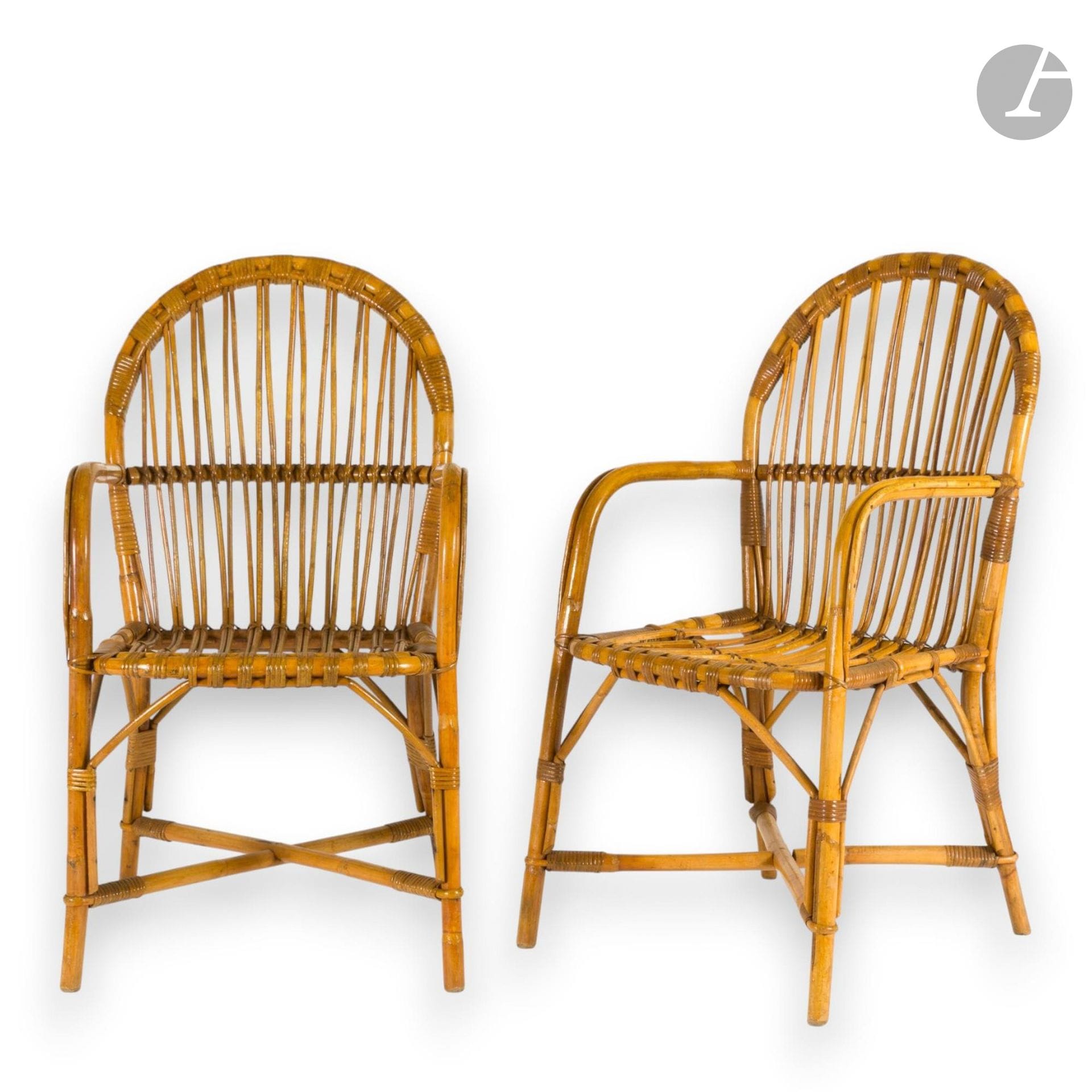 WORK OF THE 1950S-1960S
Pair of rattan armchairs with rounded arms and back.
H. 92 cm - W. 50 cm - D. 50 cm

Special collection conditions: Lots to be collected after the sale on Monday June 15 and Tuesday June 16 at Saint-Ouen.