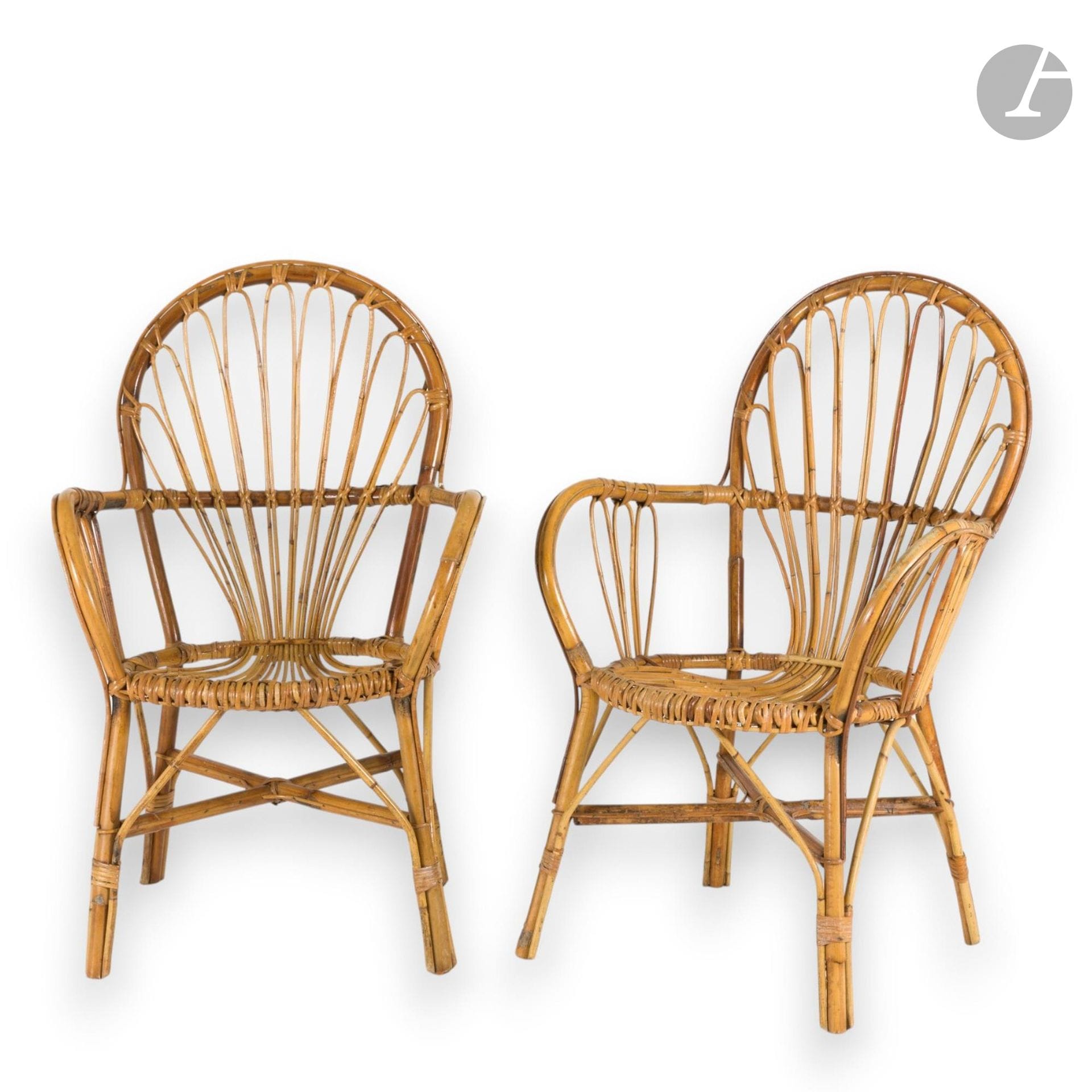 WORK FROM THE 1950S-1960S
Pair of rattan armchairs with rounded balloon backs.
Minor wear.
H. 90 cm - W. 58 cm - D.50 cm

Special collection conditions: Lots to be collected after the sale on Monday June 15 and Tuesday June 16 at Saint-Ouen.