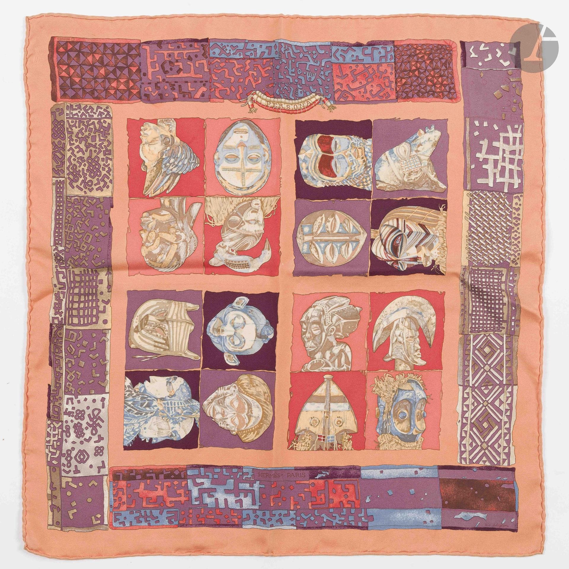 HERMÈS PARIS
Carré 90 in "Persona" silk twill, signed Loïc Dubigeon, orange background (some threads pulled)