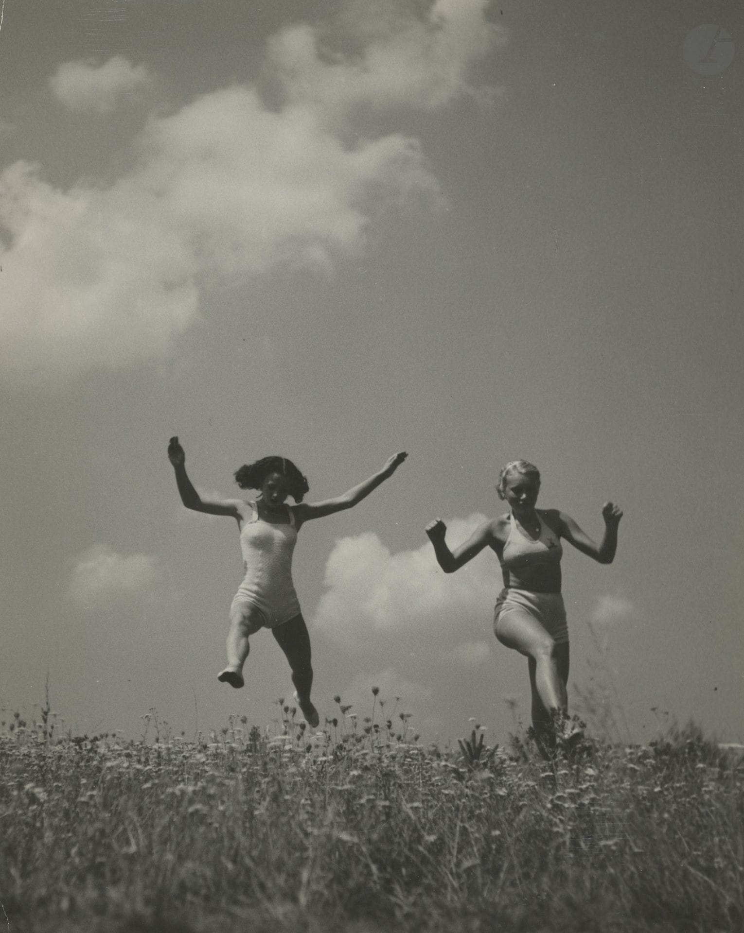 Václav Jírů (1910–1980)
Life in the Open Air [Two Women in a Flowering Meadow], c. 1935–1940.
Three original silver prints from the period. Numerous stamps from the photographer and the distributor “Pawel Barchan” on the reverse. 
Medium format: 30 x 24 cm 

Provenance: Pawel Barchan Archives.