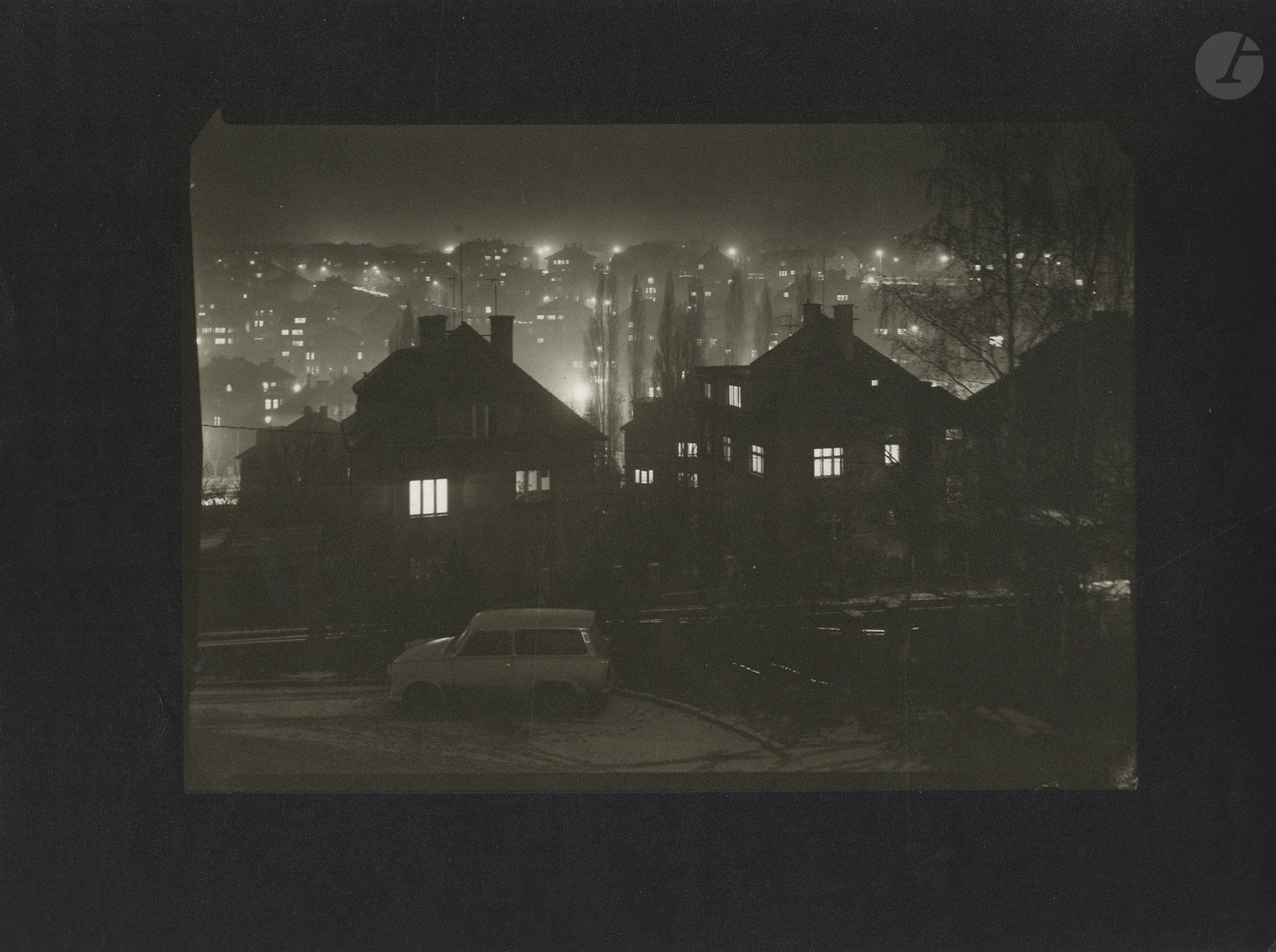 Petr Helbich (1929)
Untitled [Prague at Night], 1970.
Vintage silver print, signed and dated on the reverse.
Image: 12.5 x 17.5 cm - Sheet: 24 x 17.8 cm