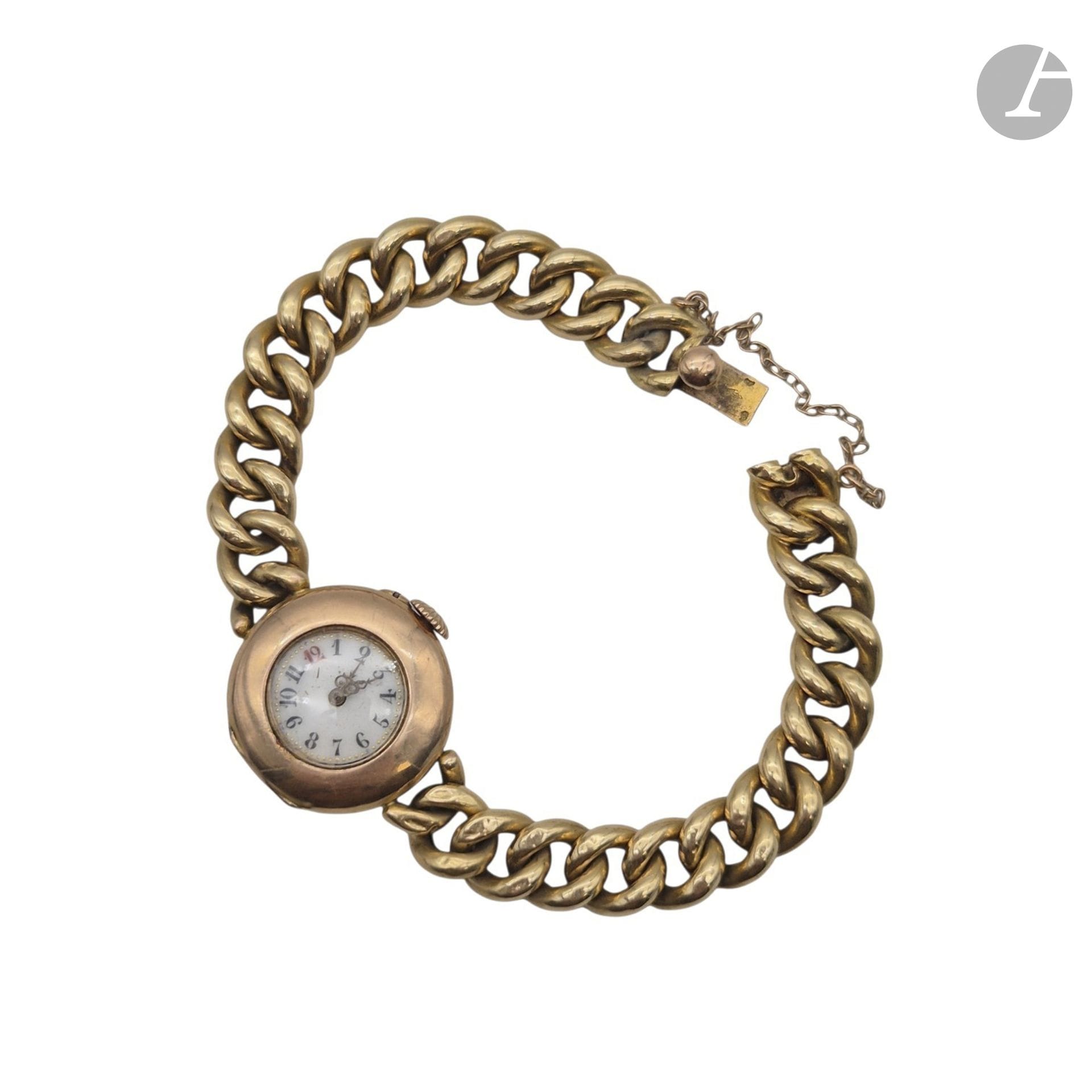 Montre bracelet en or jaune 750°/°°, avec chaînette de sécurité. 
Poids brut : 25,6 g

FRAIS ACHETEUR 8% HT