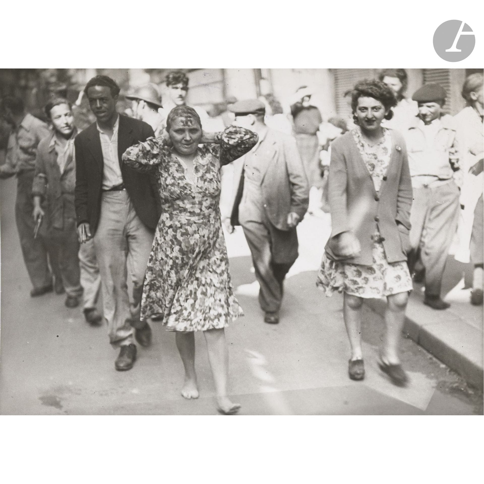 Unidentified photographer
World War II. Liberation of Paris, 1944.
Arrest of a woman with her head shaved.
Vintage silver print. “L.A.P.I.” stamp on the reverse.
17.7 x 24 cm