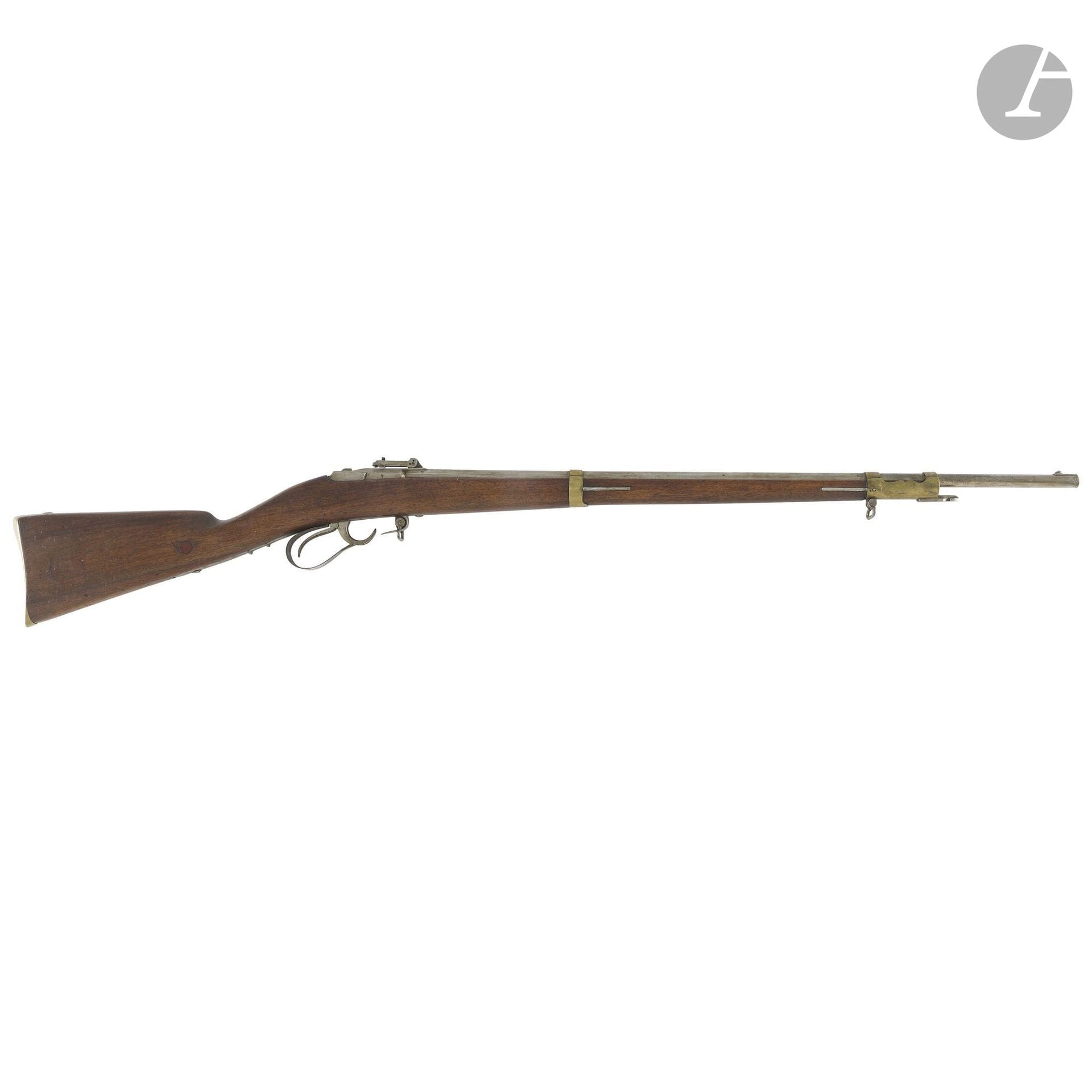 Fusil Treuille de Beaulieu modèle 1854.
Canon rond à pans au tonnerre poinçonné D sous couronne, F et C, avec hausse numérotée à 40 m sur la tranche. Garnitures en laiton poinçonné à l’exception de l’embouchoir. Crochet d’armement et queue de détente en fer.
Crosse en noyer avec cheville matriculée 14.
Longueur du canon : 78 cm - Longueur totale : 117 cm
A.B.E. (Petite piqûre au bout du canon).