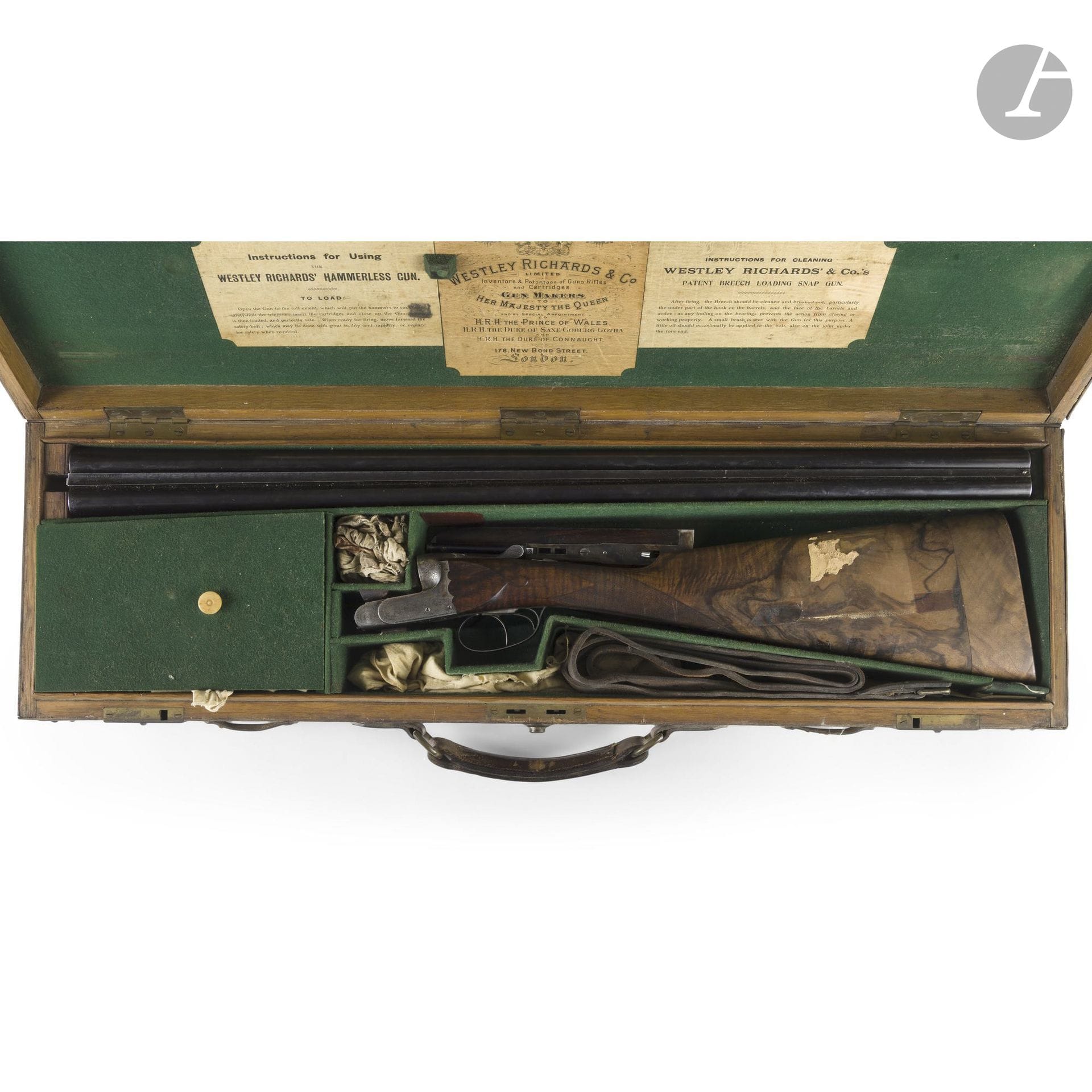 Lebeau hunting shotgun, double-barreled, 12-65 caliber.
Side-by-side barrels signed by Auguste Lebeau, ejector (heavy pitting at the chamber exits). Cut-out receiver, bronzed and signed by the dealer “MANSBENDEL HARTMANN MULHOUSE.” Trigger guard numbered 33018 and marked “EXPOSITION UNIVERSELLE PARIS 1900.” Stock made of beautiful marbled walnut, partially checkered, 41 cm long, including a 4.5 cm extension. 
Manufactured in Liège.
In a Westley Richards case containing a business card belonging to Ensign IV DURAND GASSELIN.
Category C—requires declaration.
Includes accessories: slings and cleaning rod.
No. 33018