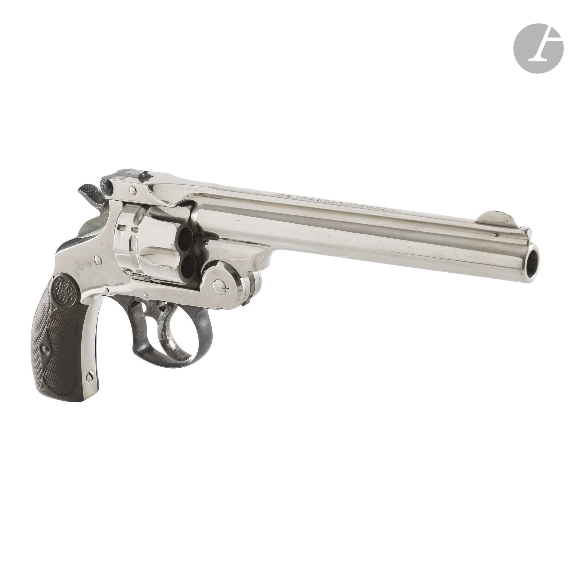Smith &amp; Wesson “44 DA” revolver, six-shot, .44 caliber, double-action.
Round barrel with a band marked with patents. “Open Top” frame. Fluted cylinder. Gutta-percha grip plates with insignia (minor restoration).
Barrel length: 16.4 cm - Overall length: 29 cm
No. 20474. Beautiful rifling.
Bronzed and polished finish.
B.E.