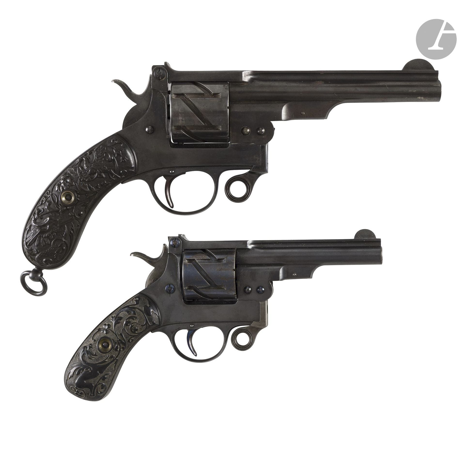 Mauser Zig-Zag (“Zick-Zack”) revolver, Model 1878, 6-shot, 7.6 mm Mauser caliber, single-action.
Round, rifled barrel with a band, marked on top “GEBR. MAUSER &amp; Cie OBERNDORF a / N WURTTEMBERG 1878.” Closed frame. Ebonite grip plates decorated with foliage and stylized dragons.
Bronzed and blued finish. Beautiful original rifling.
Barrel length: 9 cm
Overall length: 21 cm
No. 966 on the cylinder and frame.
B.E.