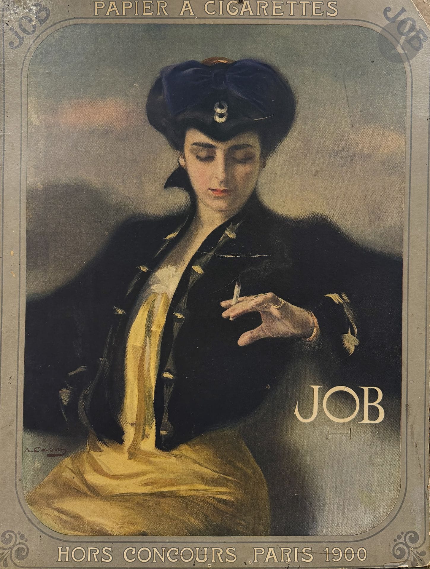 Ramón CASAS Y CARBO (1866–1932)
Job
Chromolithograph on cardboard.
Unsigned.
Signed lower left.
Fair condition; signs of wear and tear along the edges; a missing section in the upper right corner; a tear in the center.
58 x 45 cm