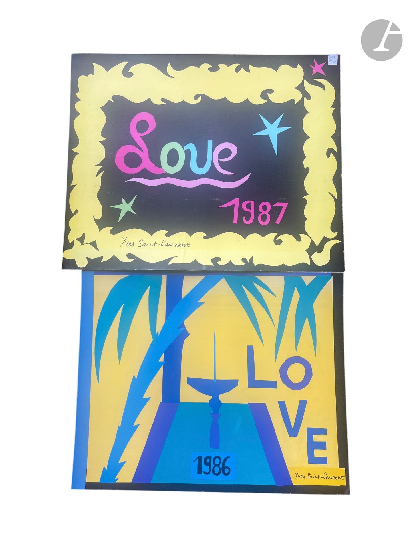 Love, 1986 and Love, 1987
Two posters by Yves Saint Laurent.
H: 59 cm - W: 72 cm and H: 54 cm - W: 67 cm
(Lot sold as is).