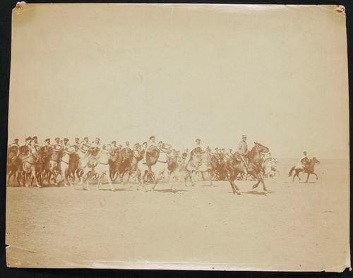 Trois photographies sur papier salé. Officiers de chasseurs à cheval et spahis indigènes. Vers 1890. 27,5 x 22 cm A.B.E. (Petites pliures).