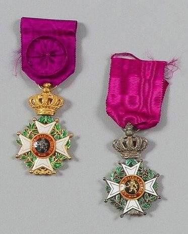 BELGIQUE
ORDRE DE LÉOPOLD, fondé en 1832. Ensemble comprenant: - Croix de chevalier à titre civil. H.: 63 mm Argent et émail. Ruban. - Croix d'officier à titre civil. H.: 63 mm Or et émail (infime éclat aux feuillages). Ruban à rosette. T.T.B. Dans leurs écrins de la Maison HEREMANS.