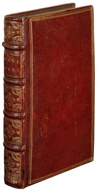 SANTEUL (Jean-Baptiste)
Hymni sacri et novi. Paris: Denis Thierry, 1689. - In-16, (8 ff.), 250 pp. ch. 248, (9 ff.). Maroquin rouge, triple filet doré en encadrement sur les plats, dos à nerfs orné, roulette dorée intérieure, tranches dorées sur marbrure (reliure de l'époque). Seconde édition, dédiée au cardinal de Bouillon, abbé de Cluny, des hymnes du célèbre poète latin, chanoine de l'abbaye de Saint-Victor, Jean-Baptiste Santeul (1630-1697). Ces hymnes étaient destinées principalement au diocèse de Paris et à l'ordre de Cluny. Le recueil se termine par les vers en l'honneur de B. Thomas de Saint-Victor et par une élégie de Claude Santeul, frère de l'auteur. L'ouvrage s'achève enfin par douze pages de musique. Très bel exemplaire réglé, en maroquin rouge de l'époque très bien conservé malgré deux petits trous de ver à un mors et au dernier caisson et un petit coup au second plat.