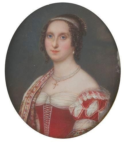 ÉCOLE FRANÇAISE VERS 1820
Femme vue à mi-corps en robe rouge et blanche, manches à soufflets, petites perles en diadème et en collier à triple rang avec une croix, châle de cachemire Miniature sur ivoire, ovale 9 x 7,2 cm. (Fêlure au bord à droite et épidermures en périphérie).