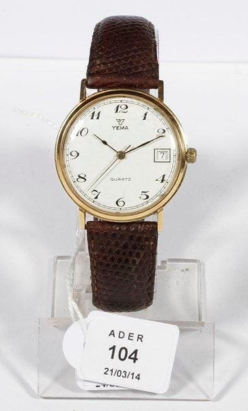 YEMA
Montre bracelet d'homme ronde  en or. Quartz. Tous chiffres, trotteuse centrale date à 3H.. Poids brut: 32 g