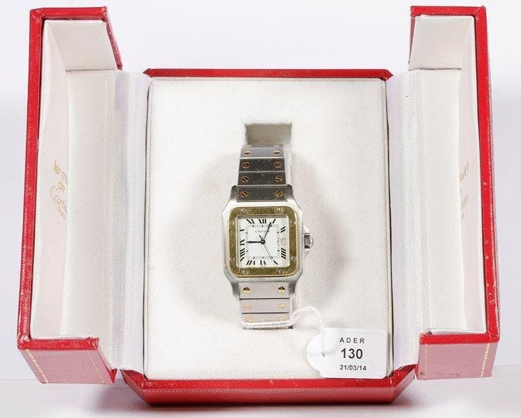 CARTIER
Montre bracelet d'homme en acier et or. Modèle Santos. Date à 3H. Taille médium.. Poids brut: 86 g. Bon état
