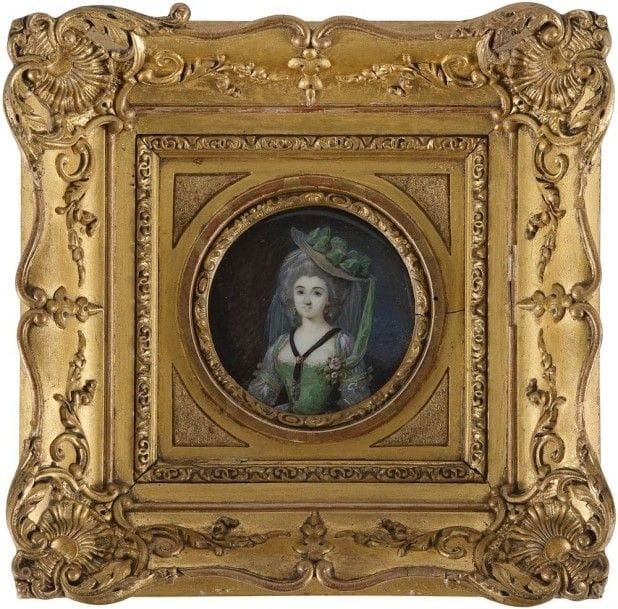 Mme FAVART née Marie-Geneviève Bellot (Paris, vers 1758 - après 1833)
Marie Desbrosses, actrice de la Comédie italienne, parée d’un voile et d’un chapeau à ruban vert dans ses cheveux poudrés, en robe verte
Miniature sur ivoire de la fin du XVIIIe siècle, diam. 6,2 cm
Signée et datée à droite : Mad. / Favart 17[8-]
Au revers, longue inscription manuscrite ancienne.
Cadre en bois stuqué et doré du XIXe siècle, 17,3 x 17,5 cm
Bibl. : La Lettre de la miniature, n°12, mai 2012, p. 3, repr. fig.2. 
Mme Favart, peintre, pastelliste et peintre en miniature, élève de Bachelier, était l’épouse de Charles-Nicolas-Justin Favart (1749-1806), fils de Charles-Nicolas Favart (1710-1792) le célèbre acteur, directeur des Comédiens italiens. Elle exposa au Salon de la Correspondance en 1776, puis au Salon en 1800 et 1808. Ses miniatures sont d’une grande rareté. 
Marie Desbrosses (1764-1856), fille d’un acteur de la Comédie italienne, avait débuté à douze ans. Elle réussit à s’imposer en 1785 dans le rôle de Justine resté vacant au départ de mme Dugazon, dans Alexis et Justine de JM Boutet de Montvel. Le Mercure de France de juillet 1785 (p. 182-185) souligne son opiniâtreté… avec un coup de griffe pour ses costumes : « Si Mlle Desbrosses qui s’est vue souvent en butte aux caprices des habitués de la Comédie italienne, si cette actrice qui a peut-être été répréhensible par la recherche affectée de sa parure dans des rôles qui n’en exigent point, n’eut pas été portée par des circonstances très imprévues, dans le personnage de Justine, si elle eut été faible et pusillanime, on ignoreroit encore combien son talent peut être utile au Théâtre dont elle est membre, intéressant pour les auteurs et agréables aux amateurs de la Comédie. Son succès présent est bien capable de la consoler des préventions passées ». 
La miniature date de ces années 1785-1788 où elle jouait les rôles de jeune première, exagérément parée ; l’actrice changea de registre en 1789 pour inter