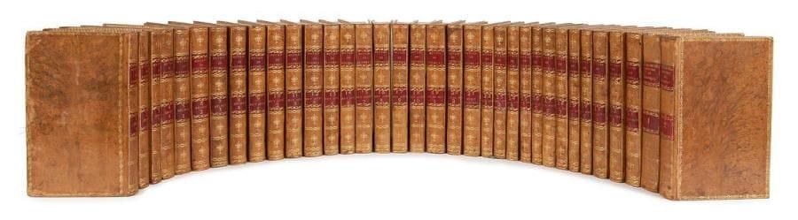 ROUSSEAU (Jean-Jacques)
[Oeuvres]. 33 volumes in-8, veau raciné, dentelle dorée en bordure des plats, dos lisse orné, roulette dorée intérieure, tranches dorées (reliure du début du XIXe siècle).

Intéressant exemplaire composite comprenant les oeuvres de Jean-Jacques Rousseau en différentes éditions mais reliées uniformément au début du XIXe siècle. Il se compose des éditions suivantes:
- Volumes 1 à 4: Émile ou de l'éducation. La Haye: Jean Néaulme, 1762. - Illustré de 5 planches dont 4 frontispices. Exemplaire enrichi d'un portrait de l'auteur gravé par Dupréel d'après Latour et des 48 pages comprenant l'Arrêt de la cour du Parlement, Qui condamne un Imprimé ayant pour titre, Émile, ou de l'Éducation et le Mandement de monseigneur l'archevêque de Paris, provenant d'une édition des oeuvres de l'auteur. Il s'agirait de la troisième édition parisienne selon la classification de McEachern (II, pp. 119-121).
- Volumes 5 à 8: La Nouvelle Héloïse, ou lettres de deux amans, Habitans D'une petite Ville au pied des Alpes... Nouvelle Édition, revue, corrigée augmentée de Figures en taille douce, d'une Table des Matières. Neuchatel, Paris: Duchesne, 1764. - Édition illustrée d'un frontispice par Cochin et de 12 planches par Gravelot.
- Volumes 9 à 18: Oeuvres... Nouvelle édition, Revue, corrigée, augmentée de plusieurs pièces qui n'avoient point encore paru. Neuchatel, 1764-1779. - 10 volumes in-8. Édition collective décrite par Dufour au n° 380. Elle aurait été imprimée après 1775 et comprend un portrait de l'auteur gravé par Littret d'après La Tour et 4 frontispices. Exemplaire fidèle à la description de Dufour à ceci près que le portrait est situé en tête du premier volume et que le tome 9 est daté 1747.
- Volumes 19 et 20: Dictionnaire de musique. Paris: Veuve Duchesne, 1775. - Exemplaire bien complet des 7 planches de musique.
- Volume 21: Esprit, maximes, et principes de M. Jean-Jacques Rousseau, de Genève. Neuchatel, en Europe: Les libraires associés, 1764.
- Volumes 