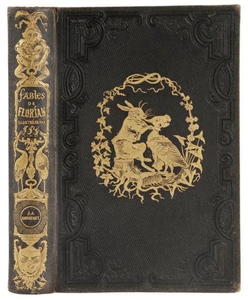 FLORIAN (Jean-Pierre Claris de)
GRANDVILLE. Fables... suivies de Tobie et de Ruth Poèmes tirés de l'Écriture Sainte et précédées d'une notice sur la vie et les ouvrages de Florian par P. J. Sthal. Paris: Garnier frères, (1851). - In-8, frontispice, XX, 292 pp., 79 planches. Percaline bleue de l'éditeur, fer dorés sur les plats et le dos, tranches dorées.


Édition publiée en 1851 reprenant celle donnée par Dubochet en 1842, illustrée de 80 planches et de plusieurs vignettes gravées sur bois d'après Grandville. 
Exemplaire dans son très beau cartonnage d'édition, orné sur les plats d'un fer inspiré d'un dessin de Grandville, représentant un lapin assis sur une souche d'arbre, posant ses pattes avant autour du coup d'une sarcelle. Ce fer, fait spécialement au départ pour les Fables de Florian (on le retrouve d'ailleurs sur des exemplaires de 1842 et 1843) est devenu générique par son utilisation entre autres sur un des cartonnages des Scènes de la vie privée et publique des animaux illustrées par Grandville et publiées par Hetzel en 1844. Le dos a été fait spécialement pour ce titre, dès la première édition; il est d'ailleurs au nom du premier éditeur Dubochet. 
Bel exemplaire malgré quelques usures aux charnières et aux coins. Rousseurs