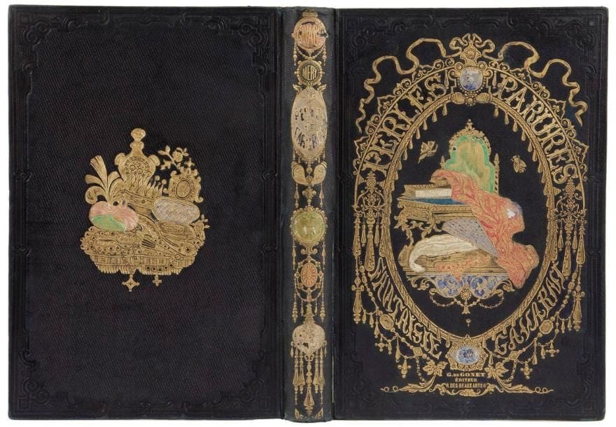 MERY (Joseph)
Les Joyaux. Fantaisie par Gavarni. Texte par Méry. Minéralogie des dames par le Cte Foelix. - Les Parures. Fantaisie par Gavarni. Texte par Méry. Histoire de la mode par le Cte Foelix. Paris: G. de Gonet, Martinon, Mme veuve Louis Janet; Leipzig: Charles Twietmeyer, (1850). - 2 volumes in-8, frontispice, (2 ff.), 316 pp., 16 planches; frontispice, (2 ff.), 300 pp., 15 planches. Percalines bleus nuit à chevrons d'édition, plats et dos ornés de plaques spéciales dorées et polychromes, tranches dorées.

Édition originale de ces beaux ouvrages illustrés au total de deux frontispices identiques et de 31 planches gravées sur cuivre par Geoffroy d'après Gavarni, en premier tirage.
Connus sous le titre général de Perles et parures, ces deux livres réunissent trente « fantaisies » composées autour des accessoires de mode féminine, 16 pour Les Joyaux et 14 pour Les Parures, par Joseph Méry. Chaque texte est accompagné d'une très belle planche gravée d'après Gavarni montrant des femmes en situation avec leur parure. L'ensemble de ces gravures forme une véritable et admirable suite d'illustrations de mode. Chaque volume se termine par un texte du comte Foelix, l'un concernant la Minéralogie des dames, l'autre l'Histoire de la mode.
UN DES EXEMPLAIRES AVEC LES PLANCHES COLORIÉES à L'ÉPOQUE ET TIRÉES SUR PAPIER VÉLIN, AVEC LES MARGES DÉCOUPÉES EN DENTELLES ET MONTÉES SUR PAPIER ROSE. - Selon Carteret (III, p. 461): "La réunion des deux ouvrages avec les gravures à marges de dentelle est assez rare à rencontrer".
Le volume des Joyaux contient un frontispice et 16 planches, et non 15 comme l'indique Carteret.
Exemplaire en cartonnage romantique. Le décor des premiers plats reprend l'encadrement du frontispice avec au centre un ensemble d'objets mosaïqués comprenant un miroir, deux livres, une étoffe, un éventail, des bijoux, etc. Fentes et restaurations aux charnières, coins et coiffes restaurés, plats très bien conservés. Tache d'encre bleue sur le bord de quelqu