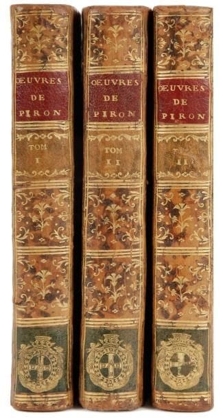 PIRON (Alexis)
Oeuvres. Paris: N. B. Duchesne, 1758. - 3 volumes in-12, frontispice, (4 ff.), 386 pp., 2 planches; (3 ff.), pp. 391-492, lxxxviij, 204 pp., 2 planches; (2 ff.), pp. 210-592 mal chiffrées 584, 12 pp., (1 f.), 2 planches. Veau marbré, dos lisse orné, armes dorées sur une pièce de maroquin vert en bas du dos, tranches rouges (reliure de l'époque).


Cohen, 805. 
Cette édition collective publiée du vivant de l'auteur, propose les principaux écrits dramatiques de Piron ainsi que diverses pièces en vers. 
Elle est très recherchée pour son illustration qui comprend un frontispice et 6 planches gravées par Flipart et Sornique d'après Cochin fils. Le frontispice, particulièrement réussi, représente les 3 genres de poésie lyrique qui s'enlacent. 
EXEMPLAIRE AUX ARMES DE LOUIS LE PELLETIER, SEIGNEUR DE ROSAMBO (1747-1794), président à mortier au parlement de Paris. Il épousa Marguerite de Lamoignon Malesherbes, fille du ministre; ils furent tous deux guillotinés le 22 mai 1794 (OHR, pl. 895). 
Dos légèrement passés. Petits travaux de vers en marge des premiers feuillets du tome 1. 
Provenance: Louis Le Pelletier, seigneur de Rosambo, avec ses armes en queue et son ex-libris
