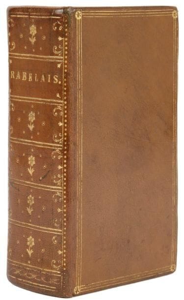 RABELAIS (François)
Les Oeuvres... Contenant cinq livres de la vie, faits dits Heroiques de Gargantua, de son fils Pantagruel. Plus, la Prognostication Pantagrueline, ou Almanac pour l'An perpetuel, Auec l'Epistre du Limousin Excoriateur: Et la Cresme Philosophale. Le tout de nouveau reveu, corrigé restitué en plusieurs lieux. Lyon: Jean Martin, s.d. (1608). - In-12, 347 pp., (3 ff.), 469 pp., (4 ff.), 166 pp., (17 ff. dernier blanc). Maroquin havane, triple filet doré en encadrement et fleuron doré aux angles sur les plats, dos lisse orné, roulette dorée intérieure, tranches dorées (reliure du XIXe siècle).

Tchémerzine, V, p. 315. 
Nouvelle édition des oeuvres de François Rabelais, la première, selon Tchémerzine, donnée par Jean Martin au XVIIe siècle. Le titre général n'est pas daté mais le titre du cinquième livre porte la date de 1608 en chiffres arabes. On retrouve la figure de la "dive bouteille" page 157 du Cinquiesme livre des faits dits Heroïques du bon Pantagruel. 
Bel exemplaire en maroquin du XIXe siècle. 
Petites traces noires au dos. Déchirure due à un défaut du papier, avec atteinte au texte, aux feuillets A5 et Ll5