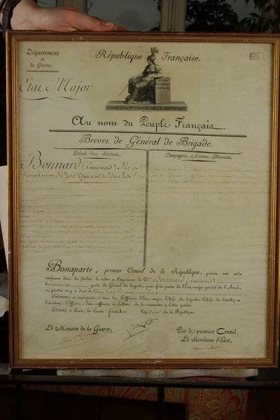 NAPOLÉON Ier (1769-1821). P.S. «Bonaparte» (secrétaire), contresignée par Alexandre Berthier, ministre de la Guerre, et Hugues Maret, secrétaire d’État, Paris 30 fructidor XI (17 septembre 1803); vélin grand in-fol. en partie imprimé avec grande vignette gravée de B. Roger au nom de Bonaparte Ier Consul de la République, sceau à froid (encadré).{CR}Beau brevet de général de brigade pour Ennemond Bonnard (1756-1819), né à Saint-Symphorien d’Ozon (Isère).
