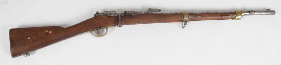 Mousqueton de gendarmerie Gras modèle 1874 M 80.
Canon rond à pans au tonnerre, avec hausse. Boîte de culasse avec marquages. Garnitures en laiton poinçonné. Crosse en noyer.
E.M