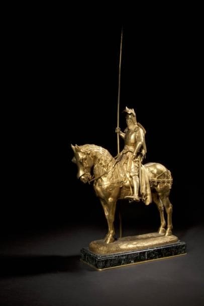 Emmanuel Fremiet (1824-1910)

Le Duc d'Orléans.
Bronze à patine dorée.
Signé E. Frémiet sur la terrasse.
Marque du Fondeur F. Barbedienne.
Repose sur un socle en marbre vert.
H.: 76 cm - Larg.: 21 cm - L.: 38 cm
(Un étrier détaché).
