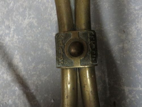 2 portants à vêtements SIEGEL en laiton fabrication début XXe siècle.