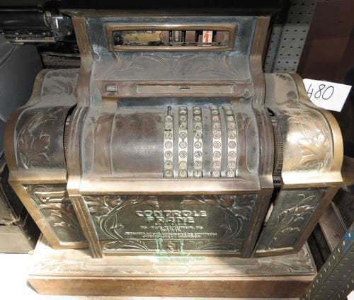 Caisse enregistreuse Contrôle France en bronze.