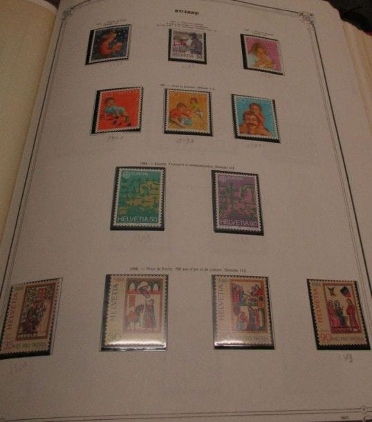 Deux albums de timbres Yvert & Tellier dont Belgique et Suisse principalement.