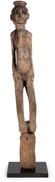 Poteau TIV (Nigéria)

Poteau «Ihambé» de protection de village, traces de libations, petits manques aux yeux, bois d'acajou à patine grise. 
H.: 127 cm