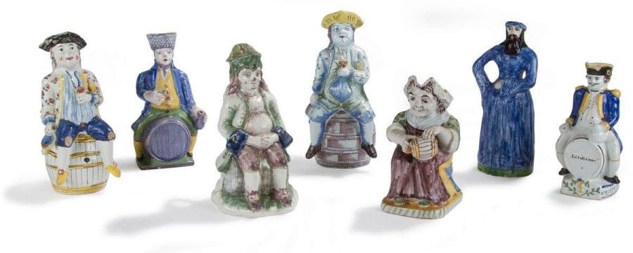 Nord et Est de la France
Lot de six pichets dont un couvert et un flacon anthropomorphe à décor polychrome Fin du XVIIIe siècle et XIXe siècle.. Quelques accidents