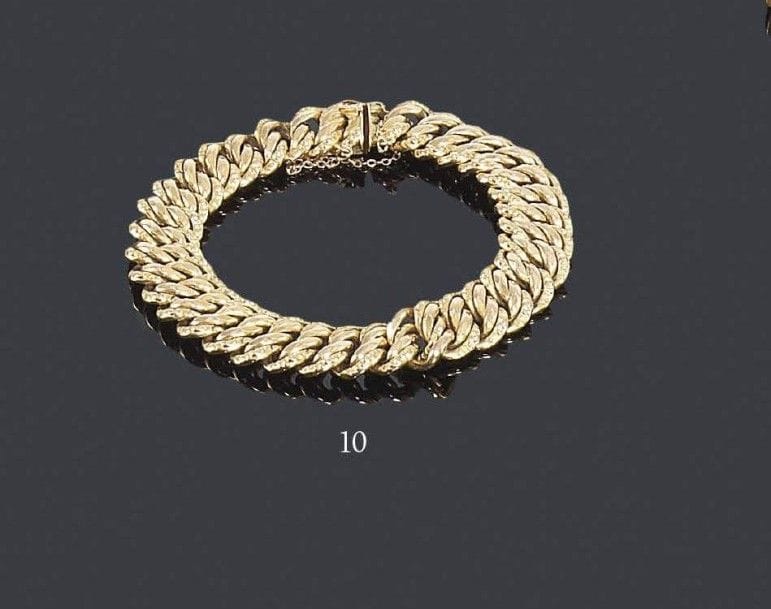 Bracelet gourmette en or jaune 18K. Longueur: 20,5 cm - Poids: 28 g