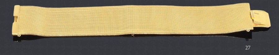 Bracelet ruban en or jaune 18K. Longueur: 18,5 g - Poids: 61,4 g (enfoncement)